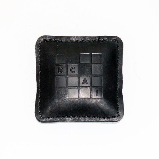 KCAI Leather Paperweight